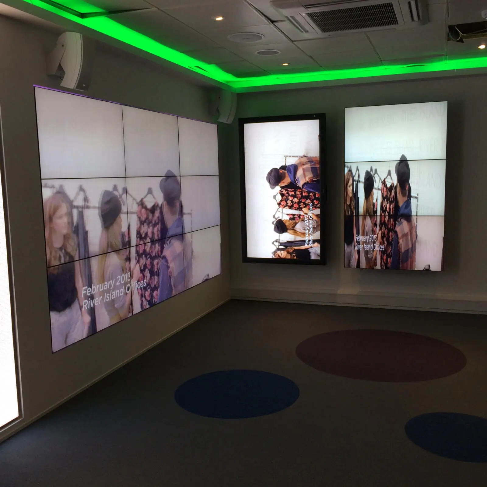 PEL UK Offices space with designer furniture and wall mounted digital screens 3